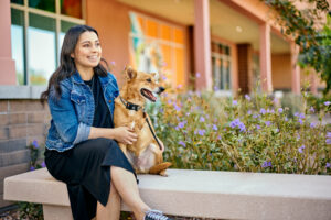 Pet parent and dog outside of Dogtopia dog daycare